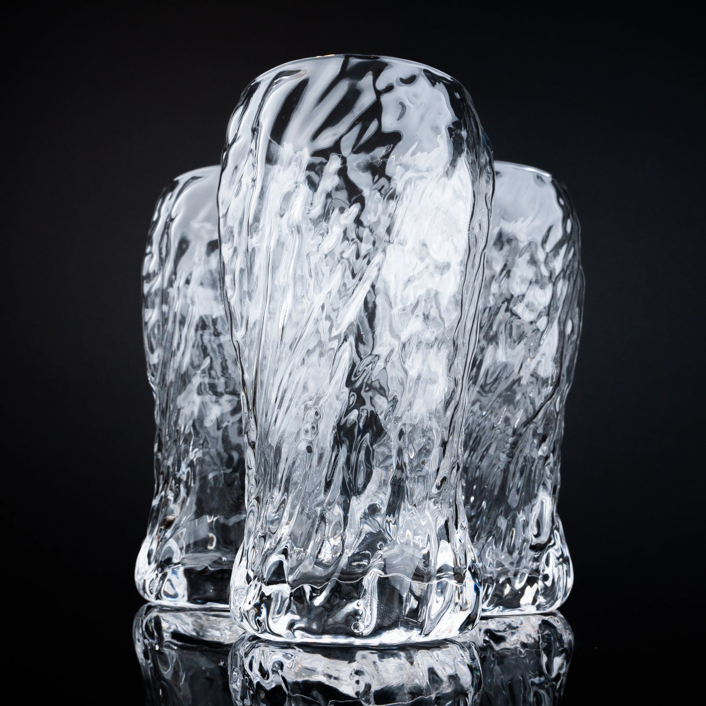 Luxury crystal tumbler set with handcrafted-inspired surface texture