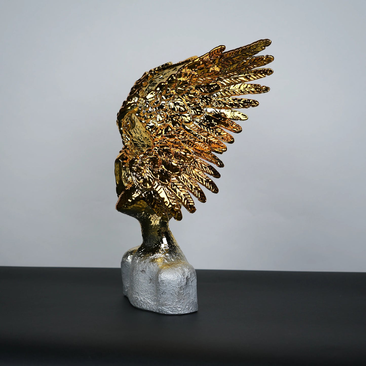 Electroplated gold phoenix wing sculpture with textured silver base – luxury modern décor.