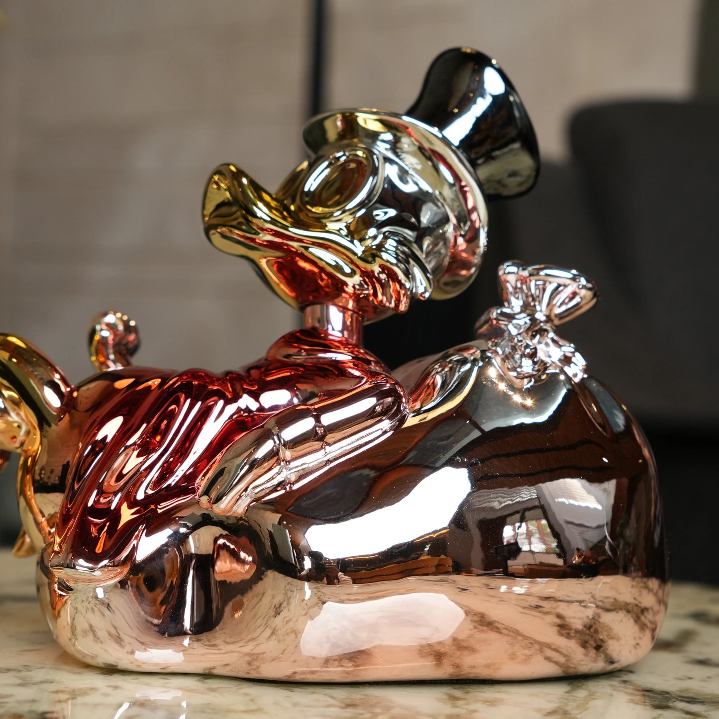 Chrome Money Tycoon gold sculpture