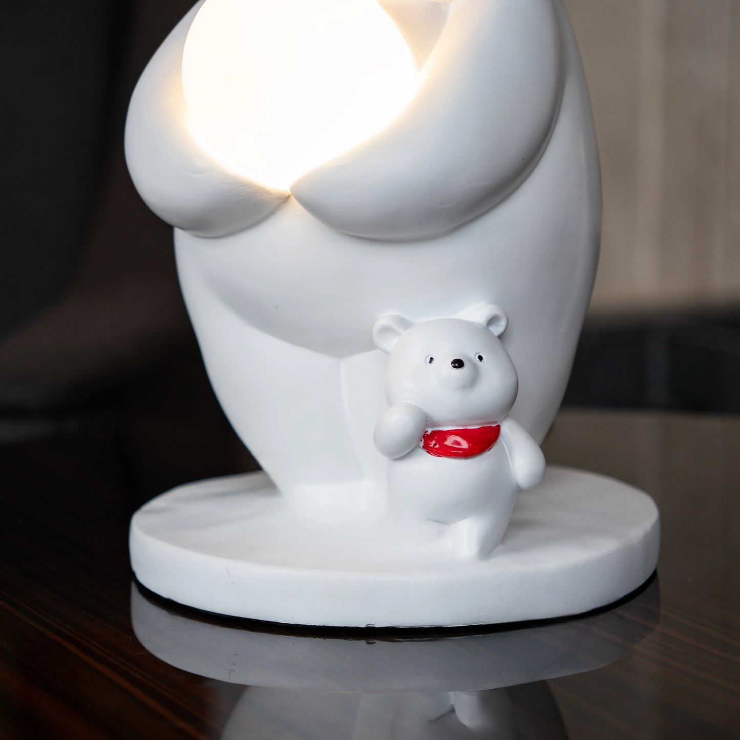 White ceramic polar-bear lamp with glowing orb and cub — Polar Glow Lamp by Ghar Art, handcrafted modern home-decor lighting for cozy and luxury interiors.