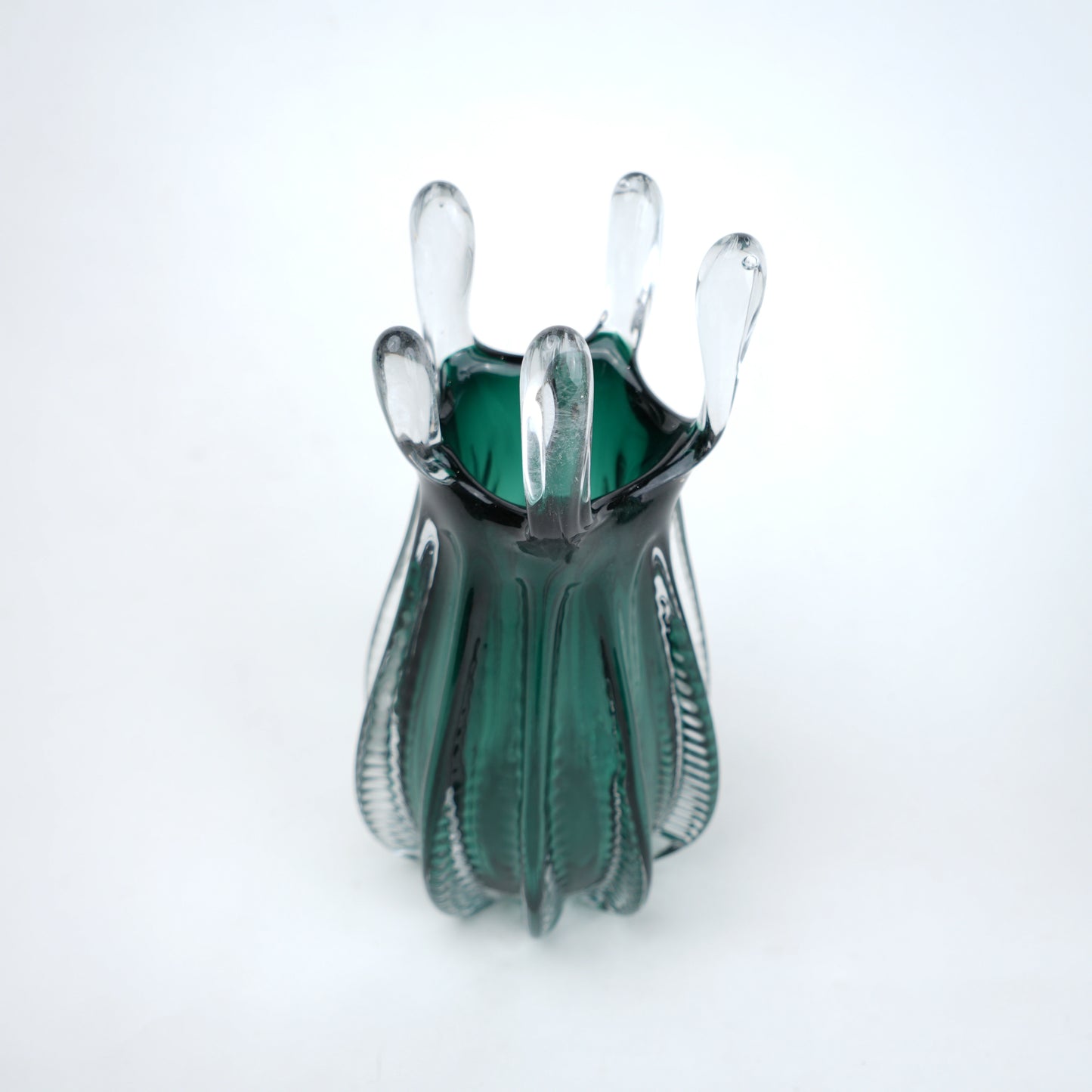 Emerald green glass vase with crown rim design available in small and big sizes for modern decor