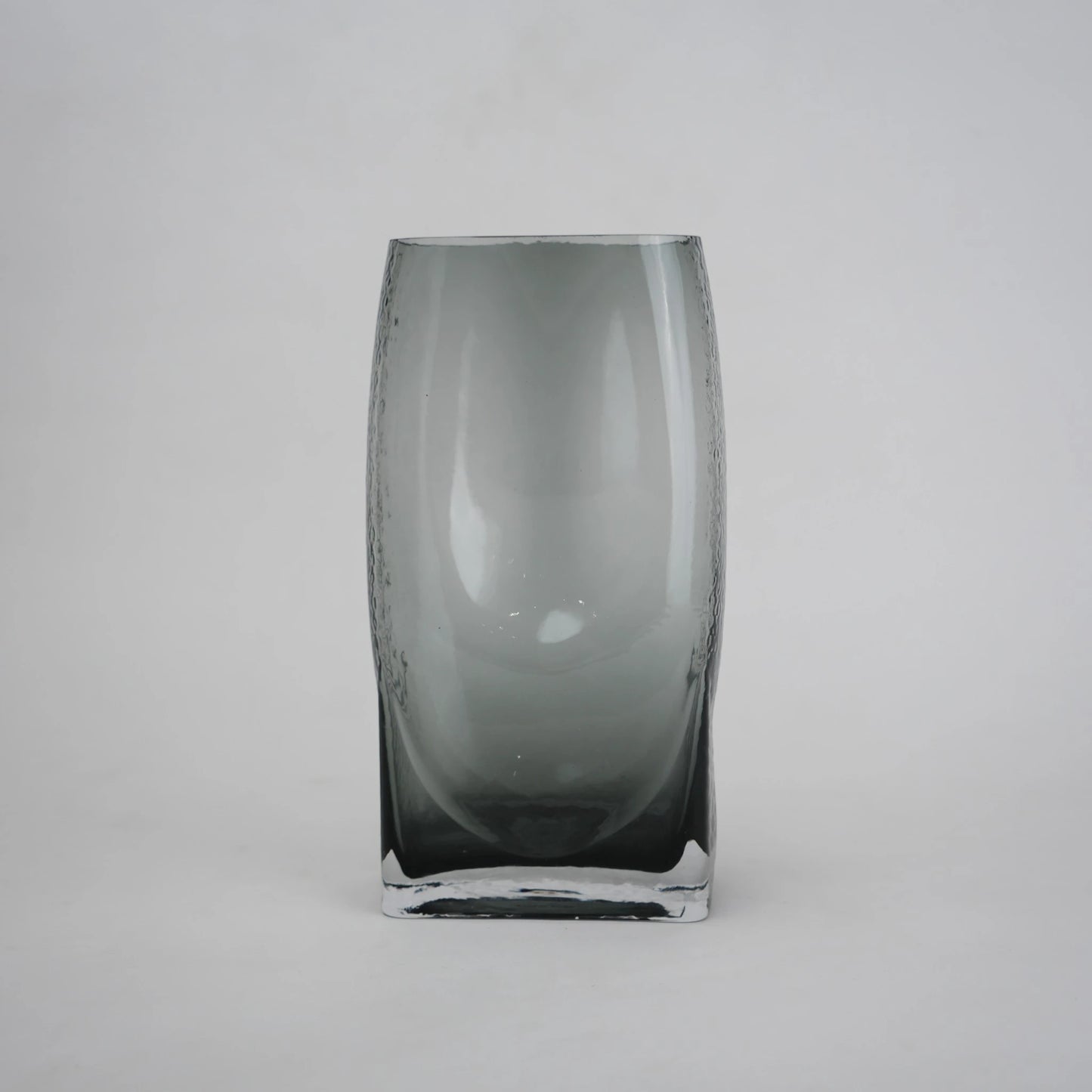grey modern glass vase with curved interior design
