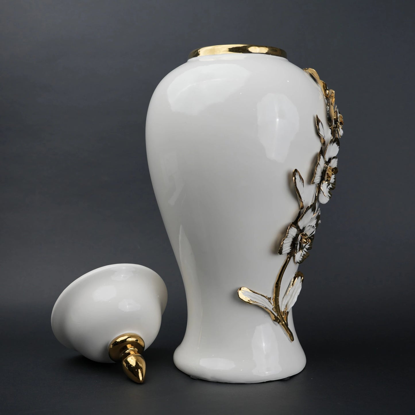 White ceramic jar with gold petal detailing and lid for decor and flower vase styling