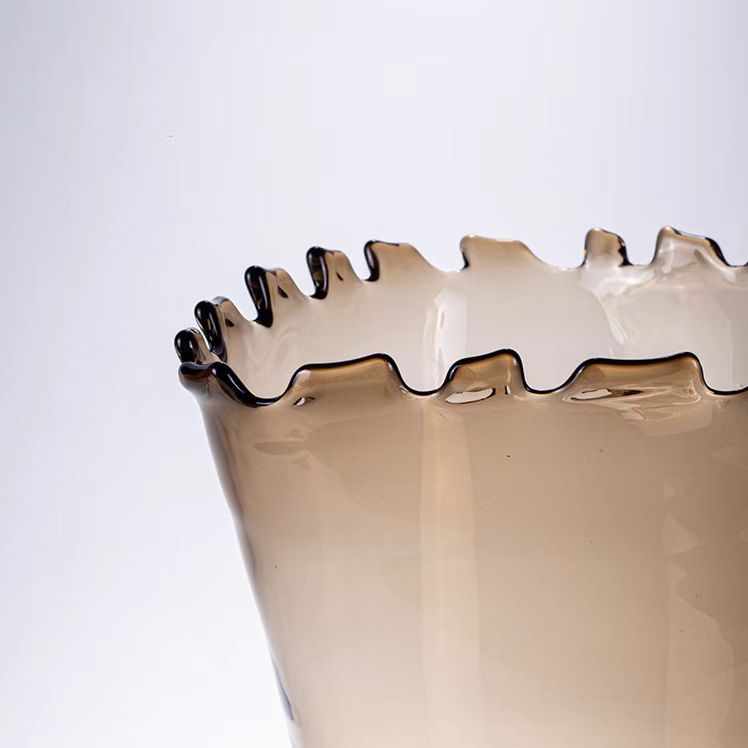 Bronze vase rim close-up, crinkled ruffle edge