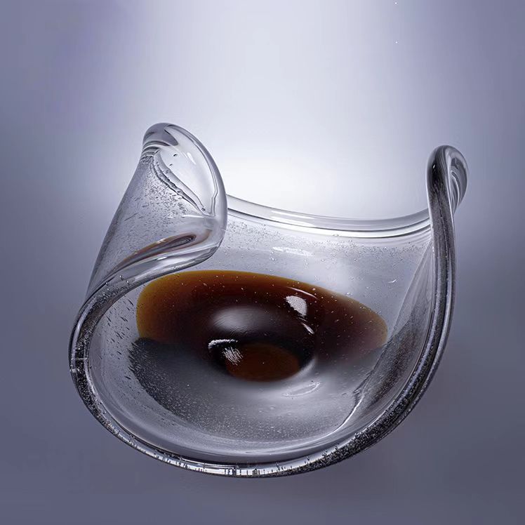 Scroll platter top-down, amber pool & rim