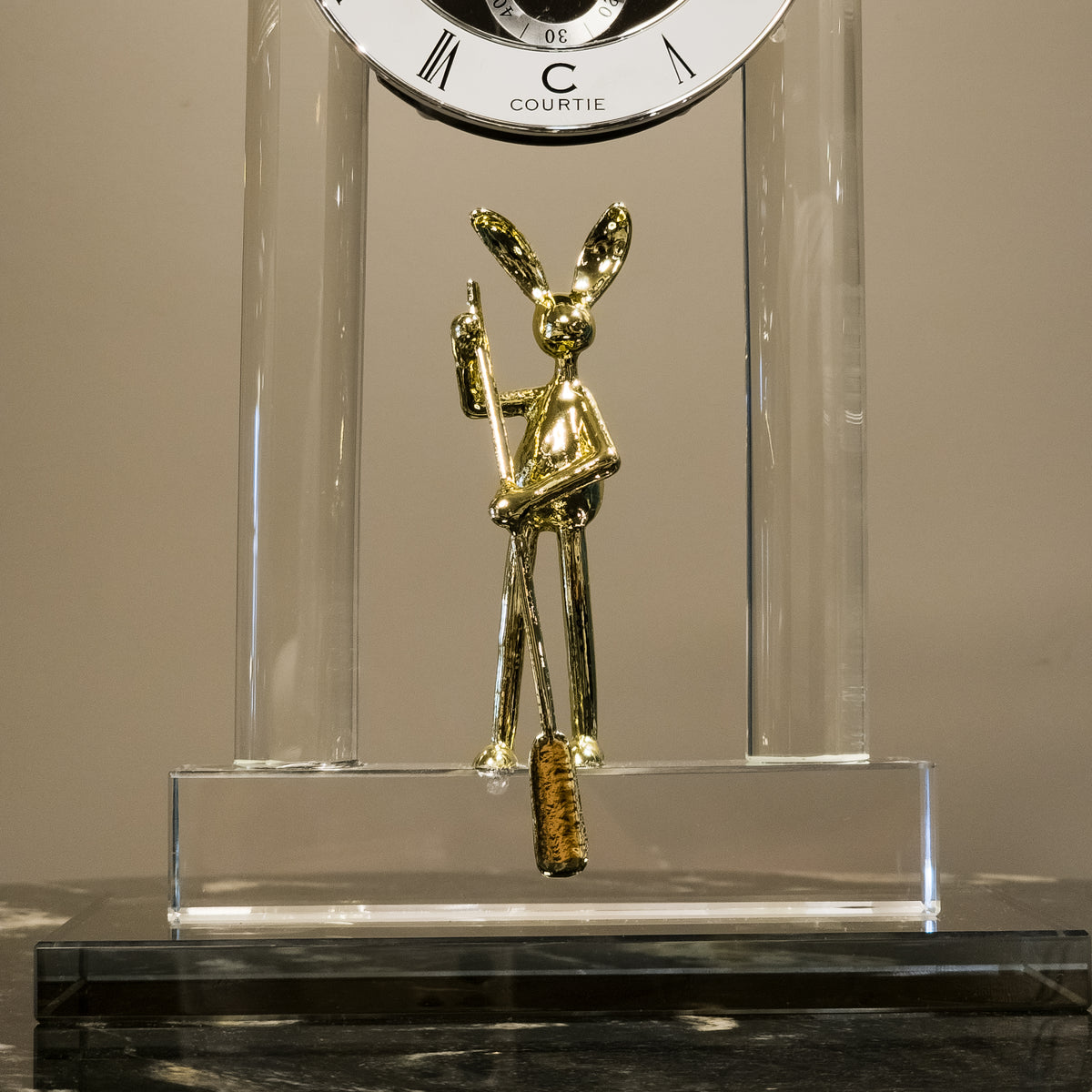 Luxury crystal table clock with exposed skeleton dial and gold rabbit figurine design for modern office and living room decor
