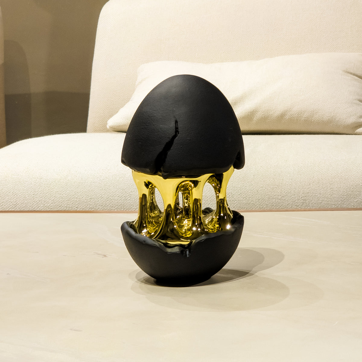 Black and gold modern decor accent with open core design