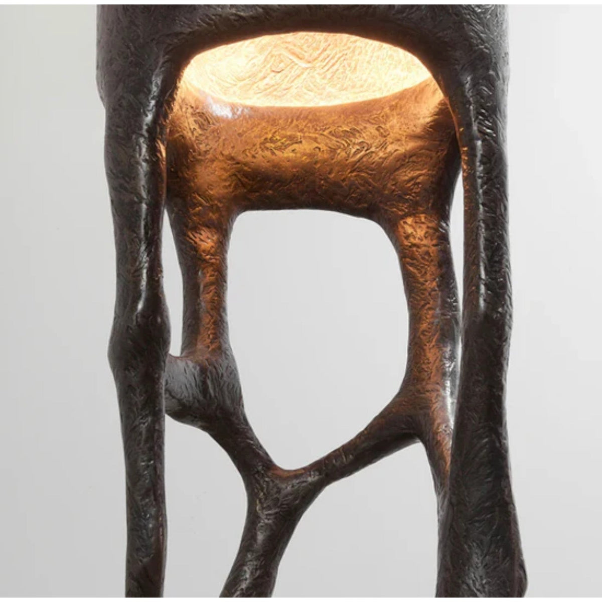 Sculpted Elegance bronze limbs glow detail