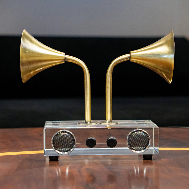 Brass tone dual horn speaker decor with clear rectangular base