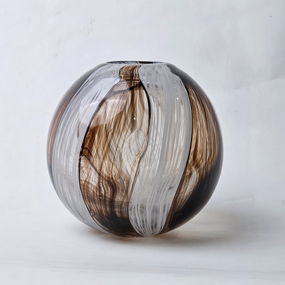 Two Bronze Elegance globe vases, scale shot