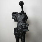 Abstract black sculpture on a white background
