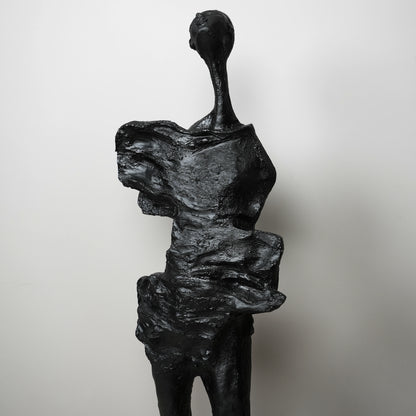 Abstract black sculpture on a white background