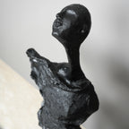 modern abstract sculpture elongated human figure decor