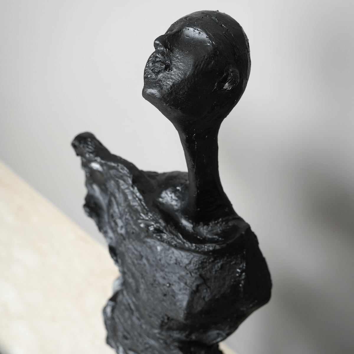 modern abstract sculpture elongated human figure decor
