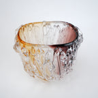 Dual tone glass vase with amber and rose tint and textured molten design in two sizes