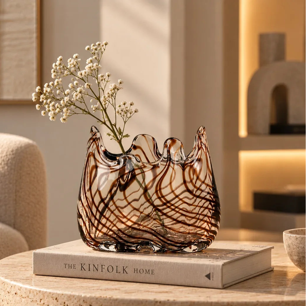 Luxury hand-blown decorative glass vase featuring an organic freeform silhouette with artistic black and brown striped detailing, ideal for fresh flowers, dried botanicals and modern home décor.