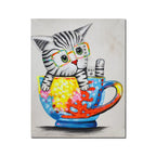 Colorful pop art kitten canvas painting with glasses sitting inside a vibrant teacup featuring abstract artistic details.