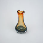 Glass vase with a unique design on a white background