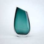 Contemporary colored glass vase designed for floral arrangements, decorative styling and elegant modern living spaces