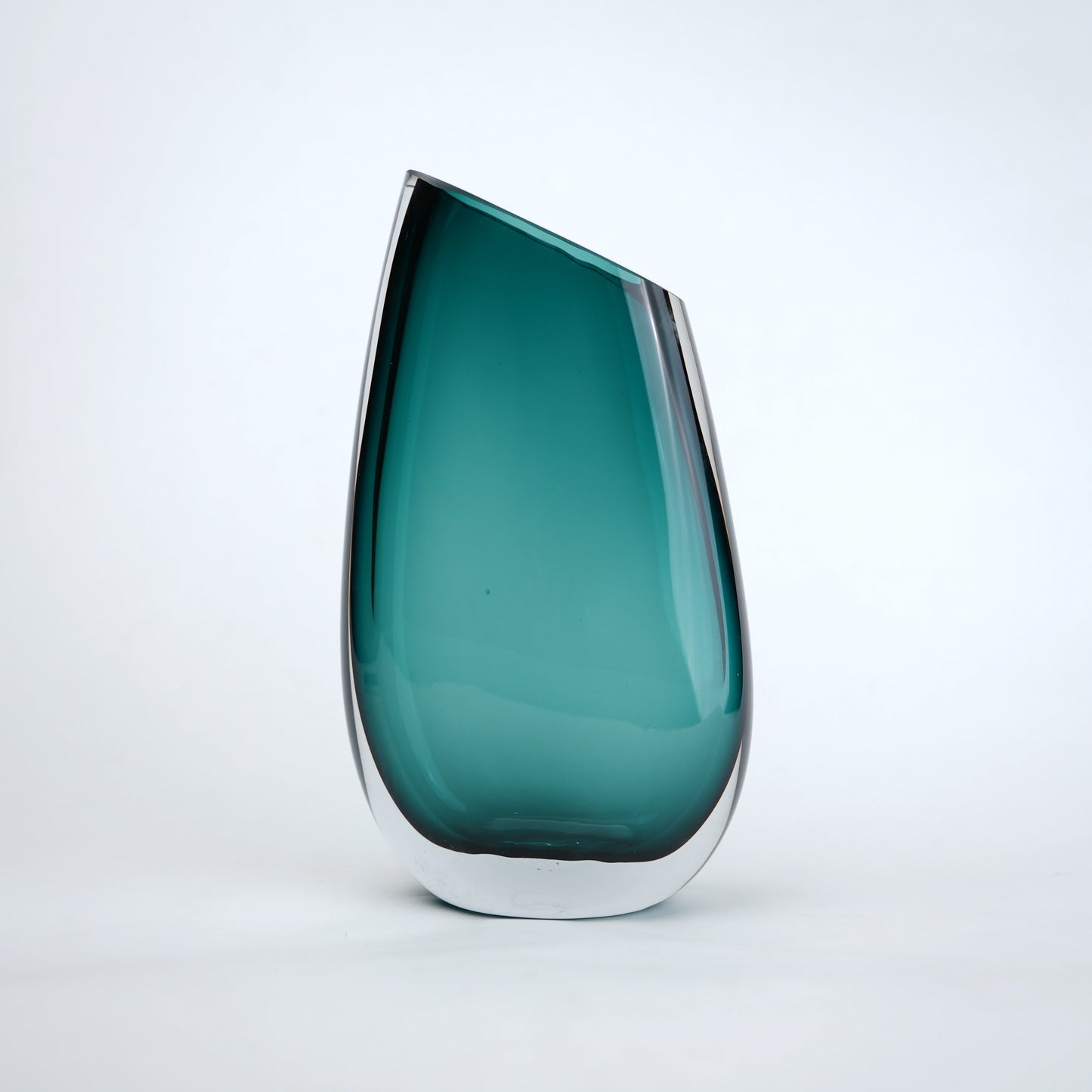 Contemporary colored glass vase designed for floral arrangements, decorative styling and elegant modern living spaces
