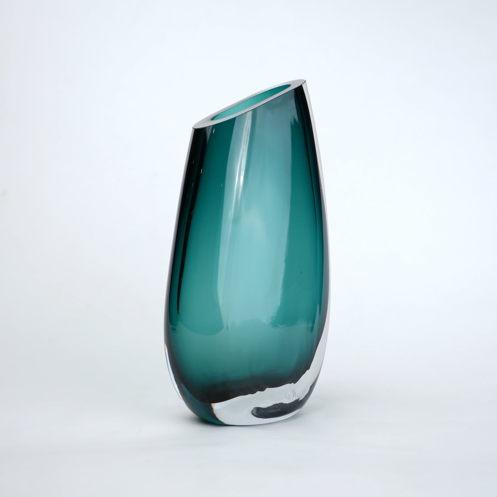 Contemporary colored glass vase designed for floral arrangements, decorative styling and elegant modern living spaces