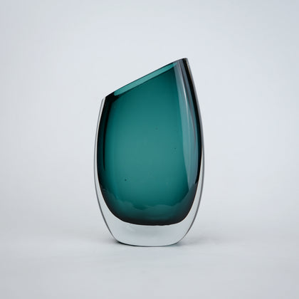 Modern sculptural glass vase collection with rich translucent finish for upscale home decor and designer interiors