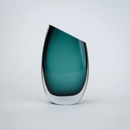 Decorative hand blown glass vase featuring organic asymmetrical form and contemporary luxury aesthetic for stylish homes