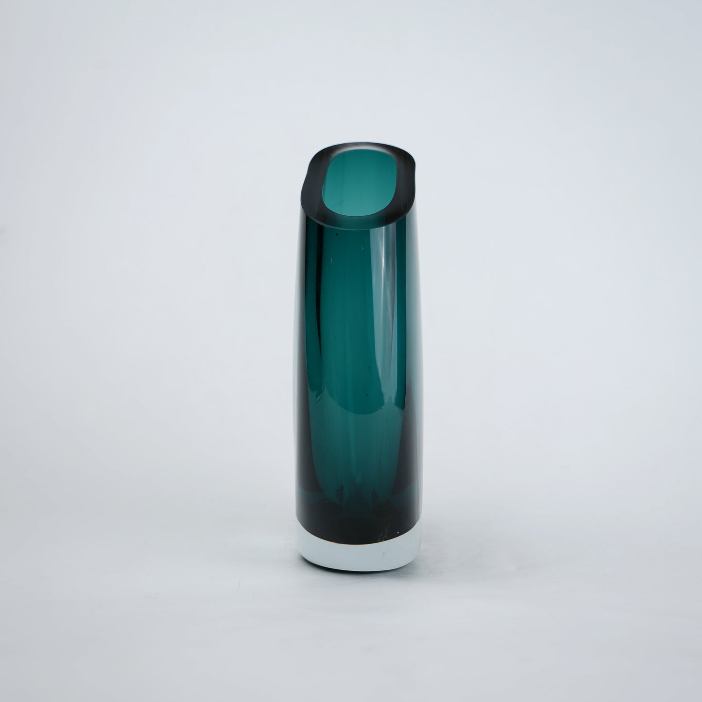 Contemporary colored glass vase designed for floral arrangements, decorative styling and elegant modern living spaces