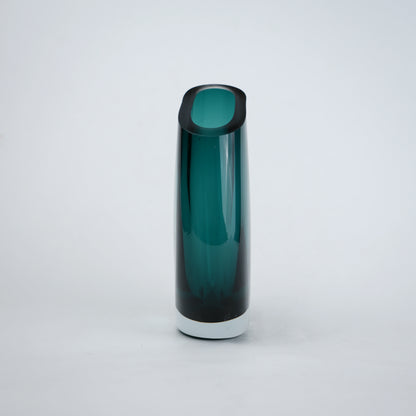 Contemporary colored glass vase designed for floral arrangements, decorative styling and elegant modern living spaces