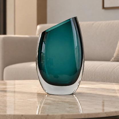 Modern sculptural glass vase collection with rich translucent finish for upscale home decor and designer interiors