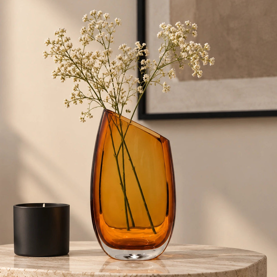 Modern sculptural glass vase collection with rich translucent finish for upscale home decor and designer interiors