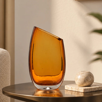 Modern sculptural glass vase collection with rich translucent finish for upscale home decor and designer interiors