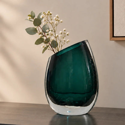 Modern sculptural glass vase collection with rich translucent finish for upscale home decor and designer interiors