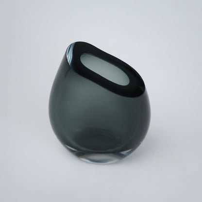Modern sculptural glass vase collection with rich translucent finish for upscale home decor and designer interiors