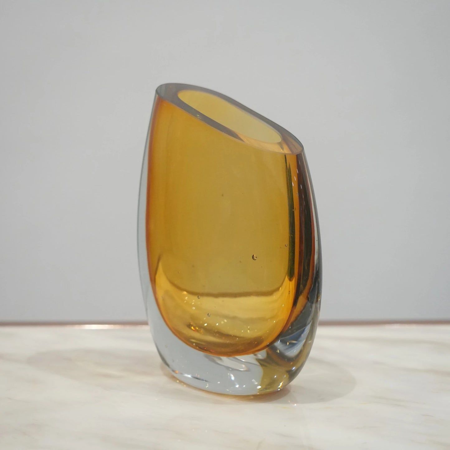 Artistic glass vase set with contemporary tilted silhouette designed for luxury coffee table and console decor styling