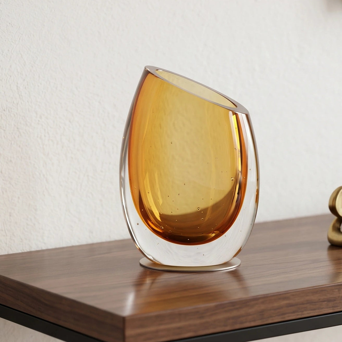 Modern sculptural glass vase collection with rich translucent finish for upscale home decor and designer interiors