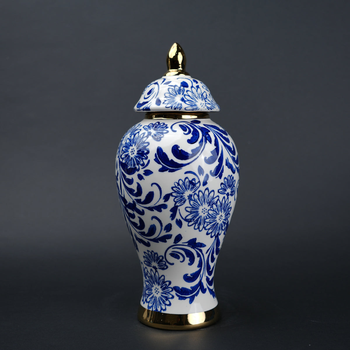 Blue and white ceramic jar with floral design and lid for home decor styling