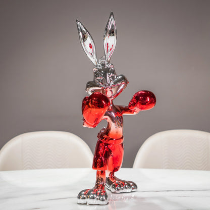 Resin bunny boxer figurine with chrome black finish and scarlet red gloves and shorts