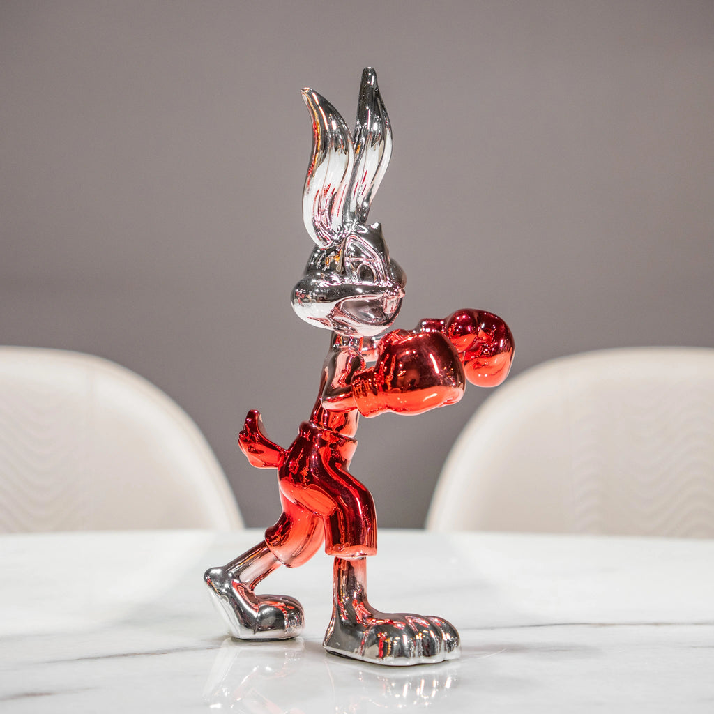 Resin bunny boxer figurine with chrome black finish and scarlet red gloves and shorts