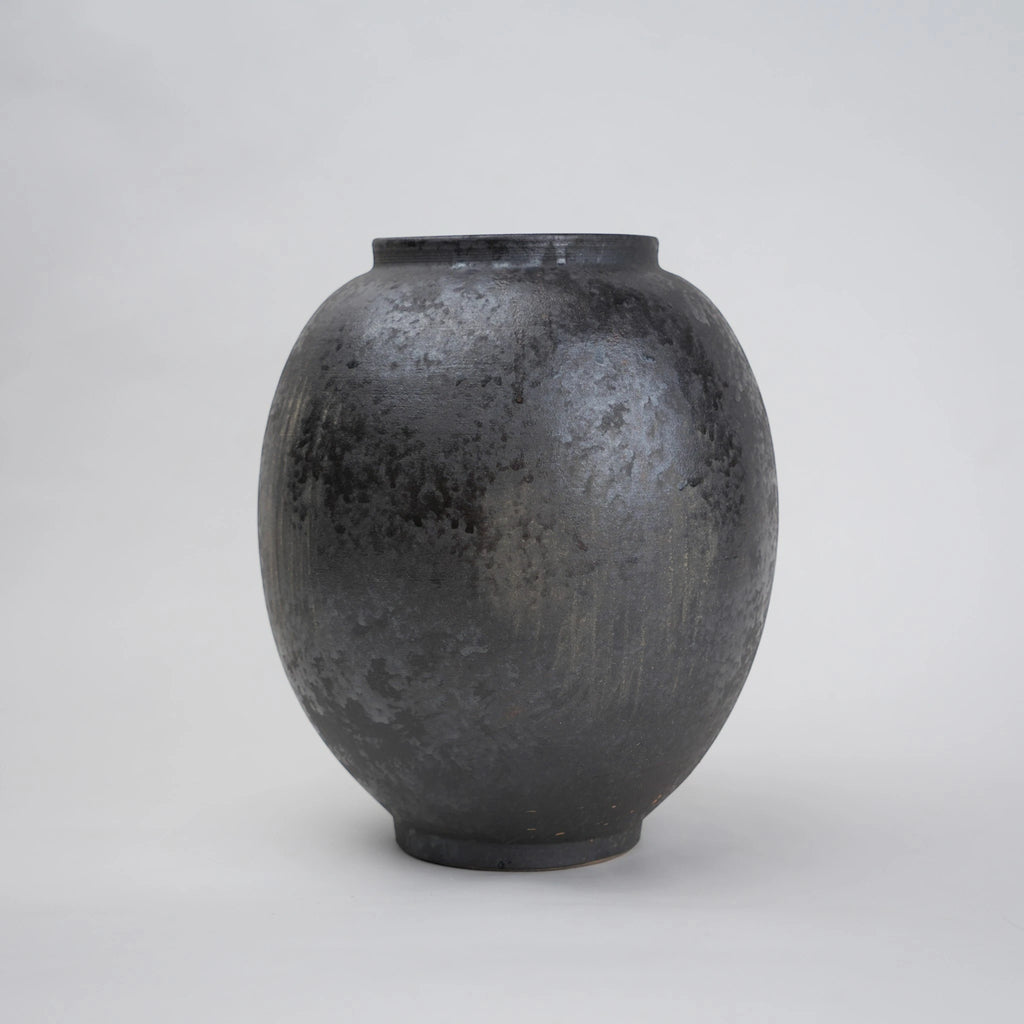 Two gray ceramic vases for styling flowers in living room, coffee tables or consoles