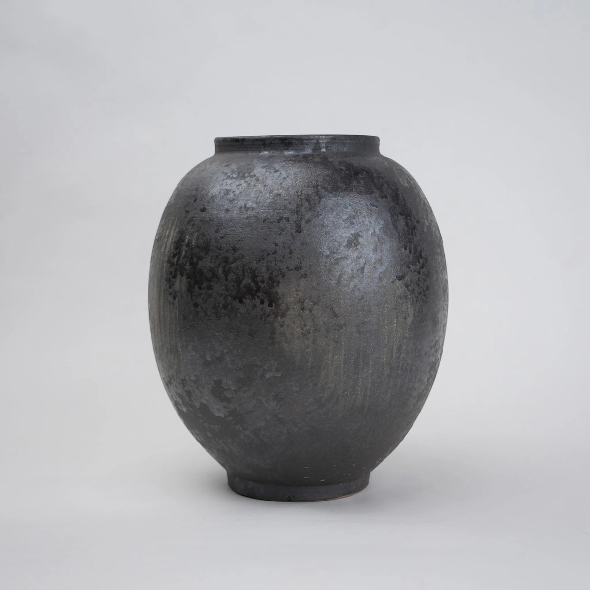 Two gray ceramic vases for styling flowers in living room, coffee tables or consoles