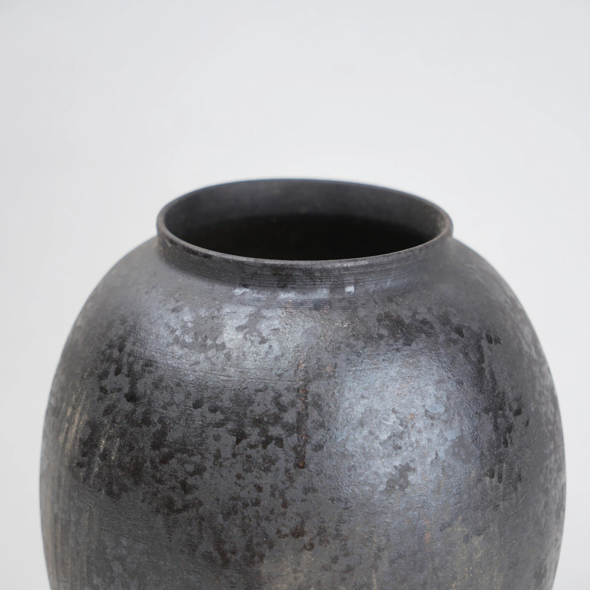 Two gray ceramic vases for styling flowers in living room, coffee tables or consoles