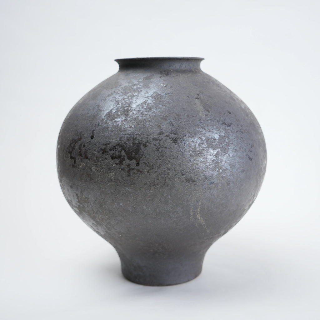 Two gray ceramic vases for styling flowers in living room, coffee tables or consoles