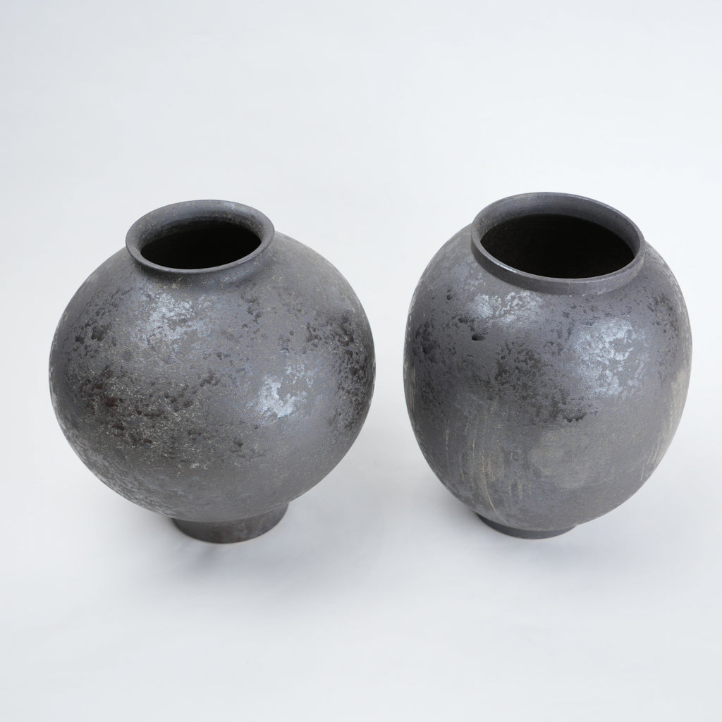 Two gray ceramic vases for styling flowers in living room, coffee tables or consoles