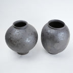 Two gray ceramic vases for styling flowers in living room, coffee tables or consoles