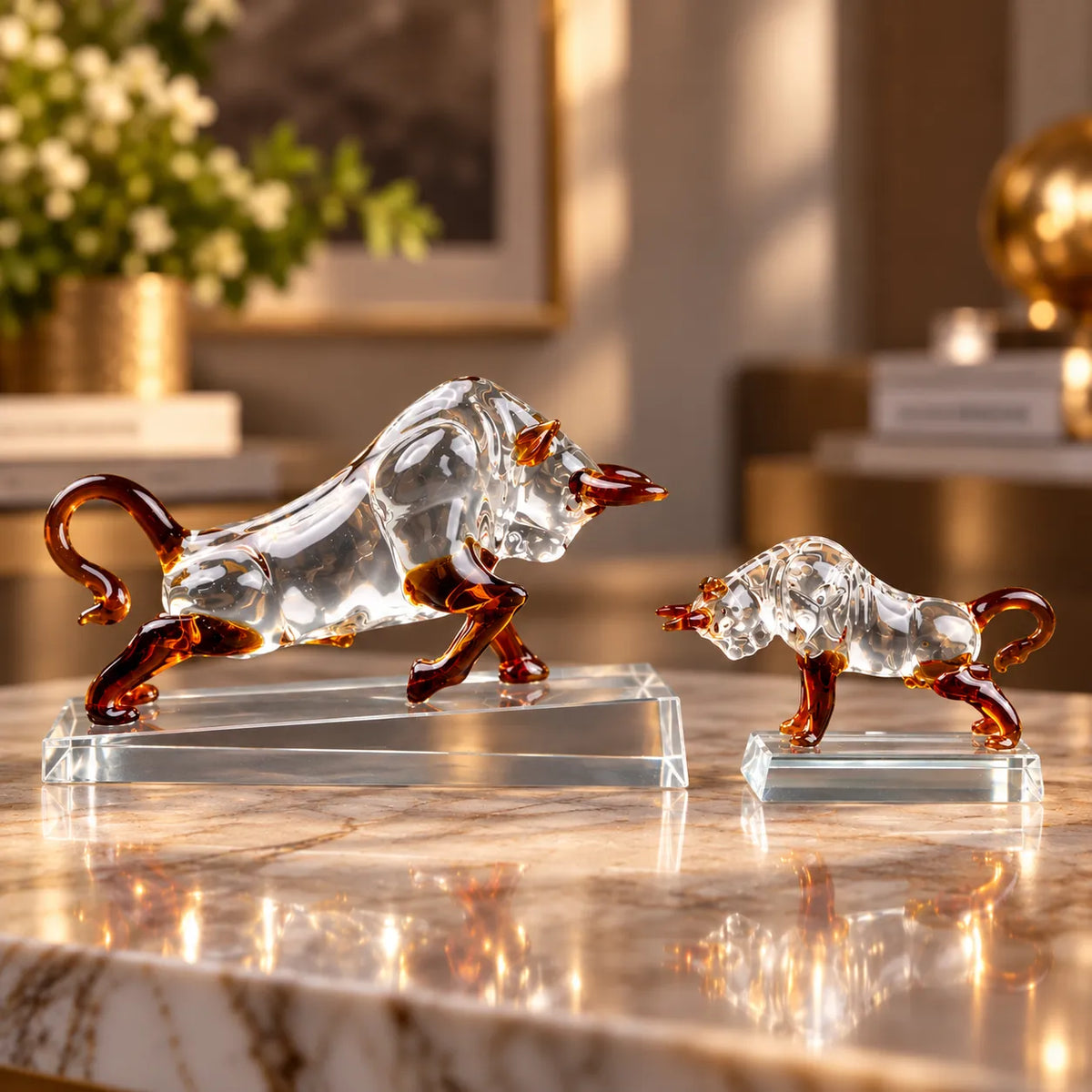 Crystal Charge Luxury Bull sculpture with clear body, amber accents and transparent base