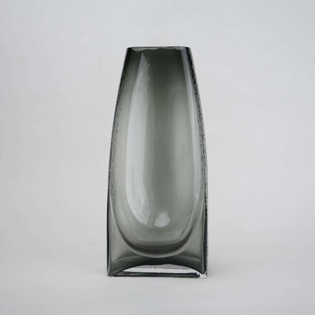 Curved grey vase pair w/ rose, travertine
