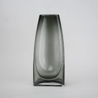 grey modern glass vase with curved interior design