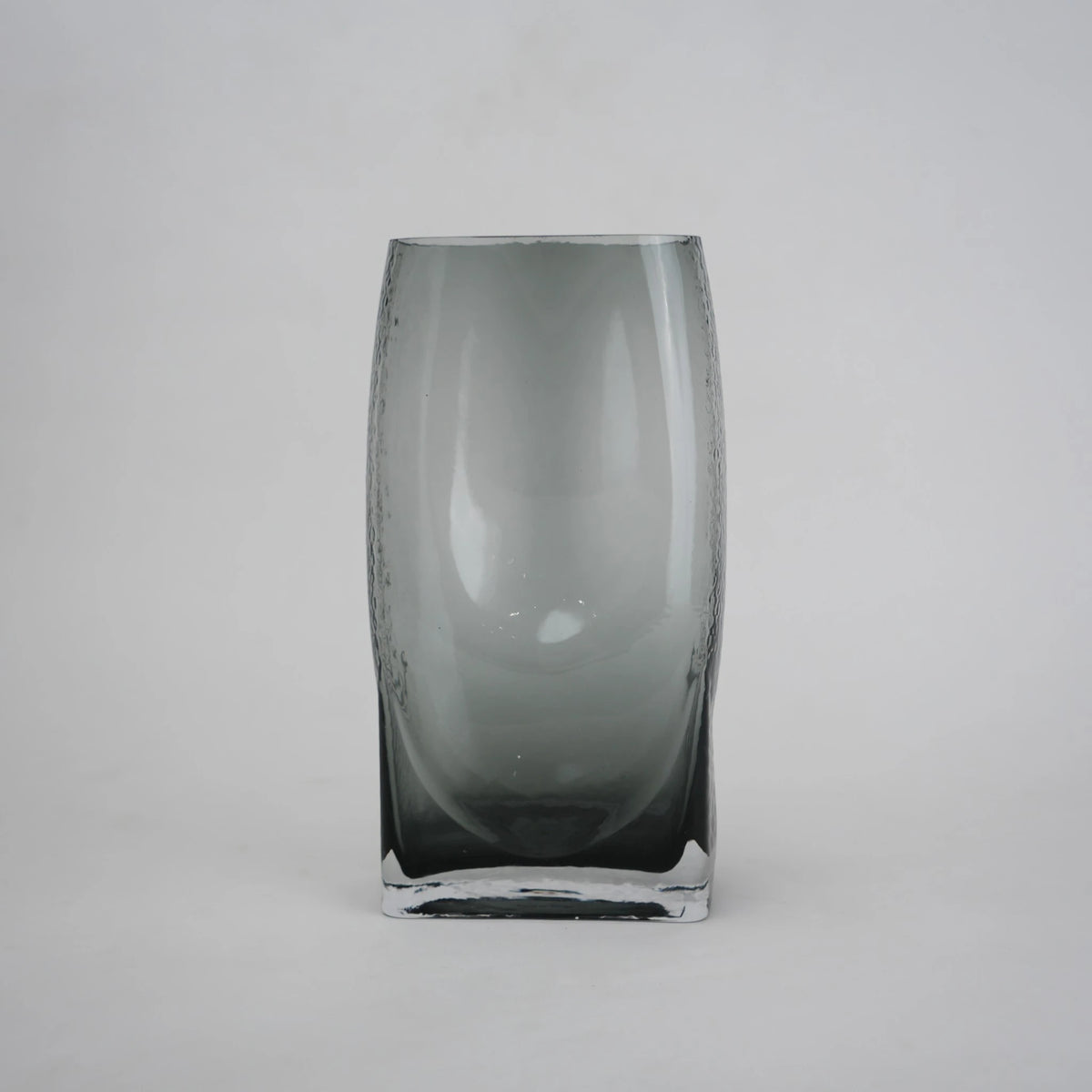 grey modern glass vase with curved interior design