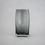 grey modern glass vase with curved interior design